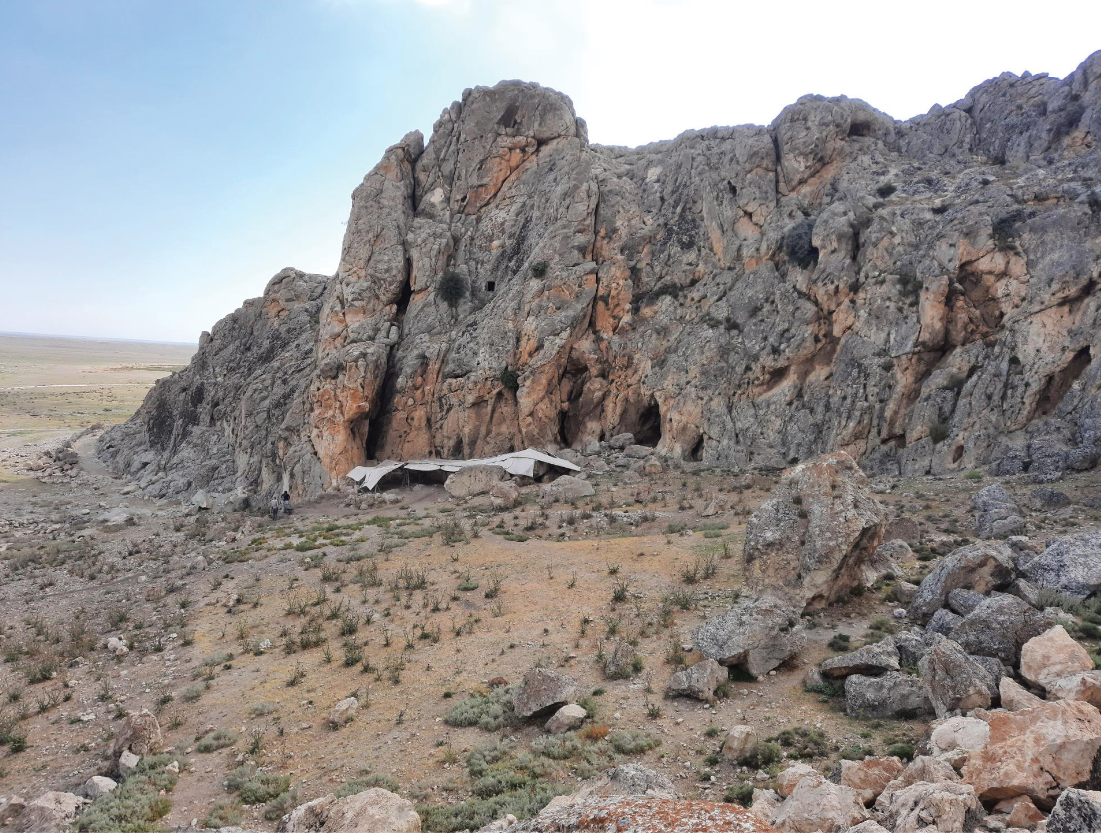 The rock shelter at Pınarbas¸ı (above) was first occupied during the Epipalaeolithic period. Human remains dating to roughly 13,500 BC (left) were found at the site and belong to an individual with genetic links to people in the Levant and south-east Europe.