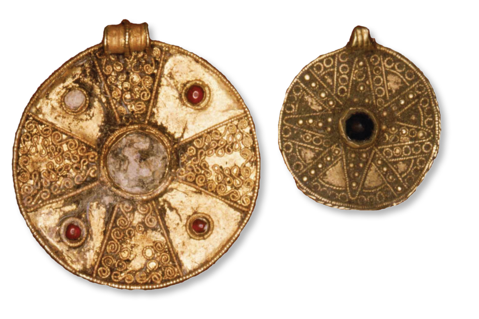 LEft & above The two pendants that triggered the Sawcliffe excavation after being found by metal-detectorists. It was later possible to allocate them to the burial they came from: the heavily ploughed Grave 41 (H10 on the plan opposite).