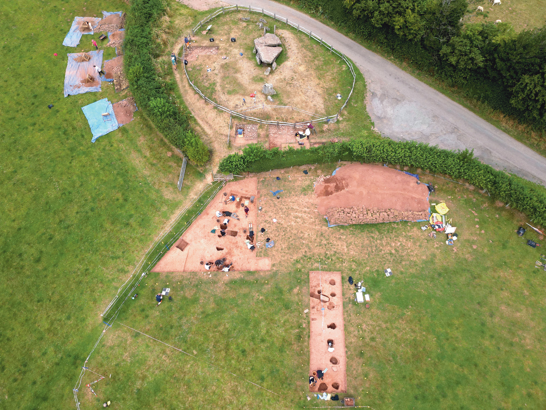 ABOVE In 2021 and 2022, excavations just to the south of Arthur’s Stone revealed even earlier monumental activity, in the form of the southern end of the original revetted turf mound, and south again from this an avenue of timber posts that had subsequently been replaced with standing stones.