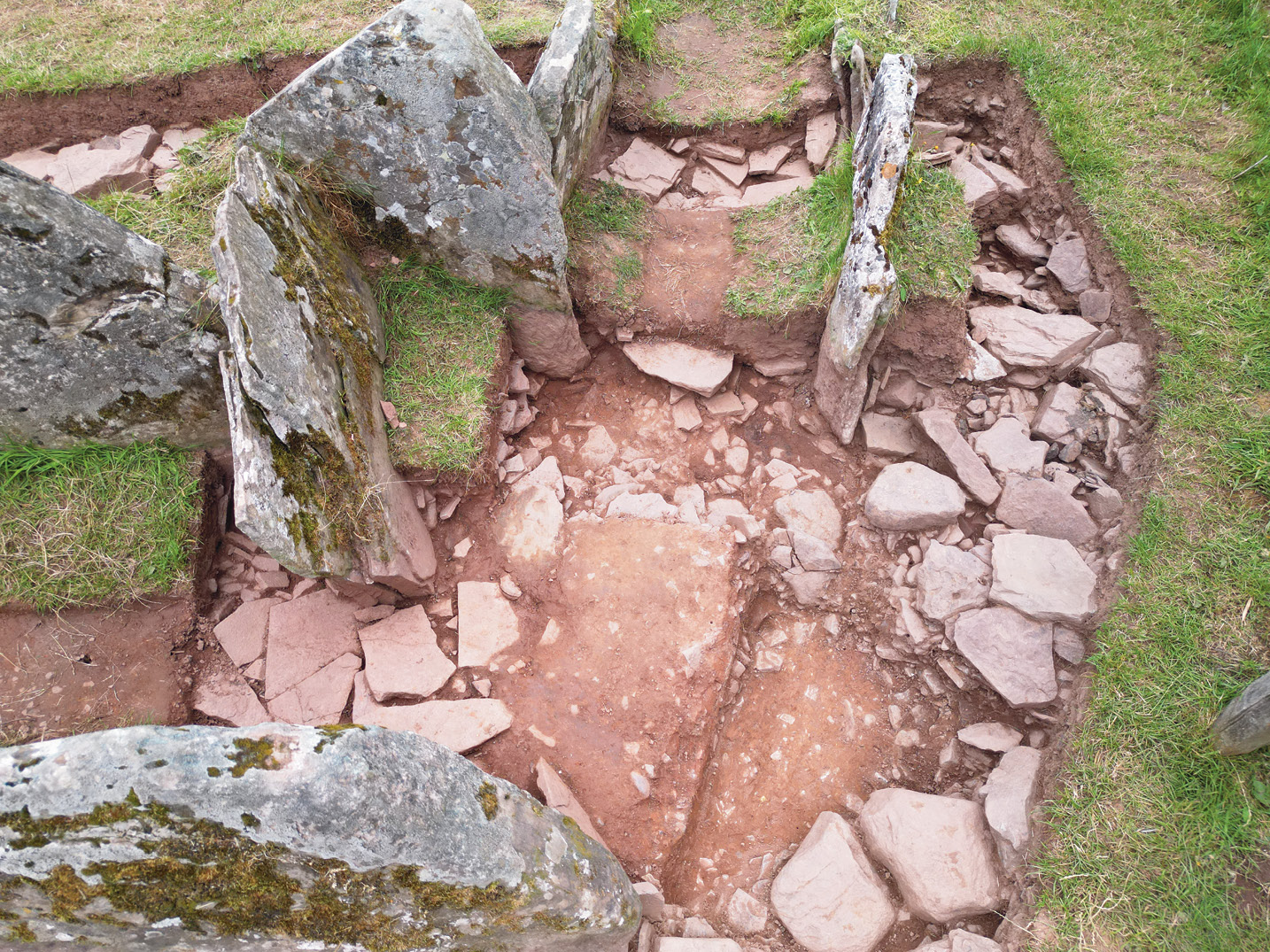 right Part of the passageway (the right-hand side in this photograph) was built not with orthostats, but with drystone. Might this represent a T-shaped design that was later blocked up?