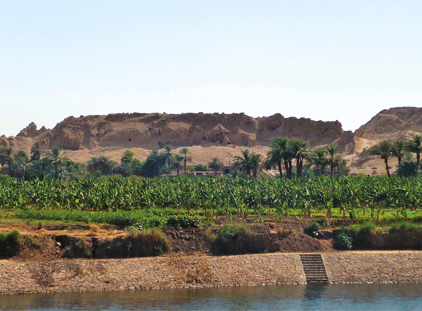 above A view of Gebelein from the Nile. left Gebelein Man on display in the British Museum.